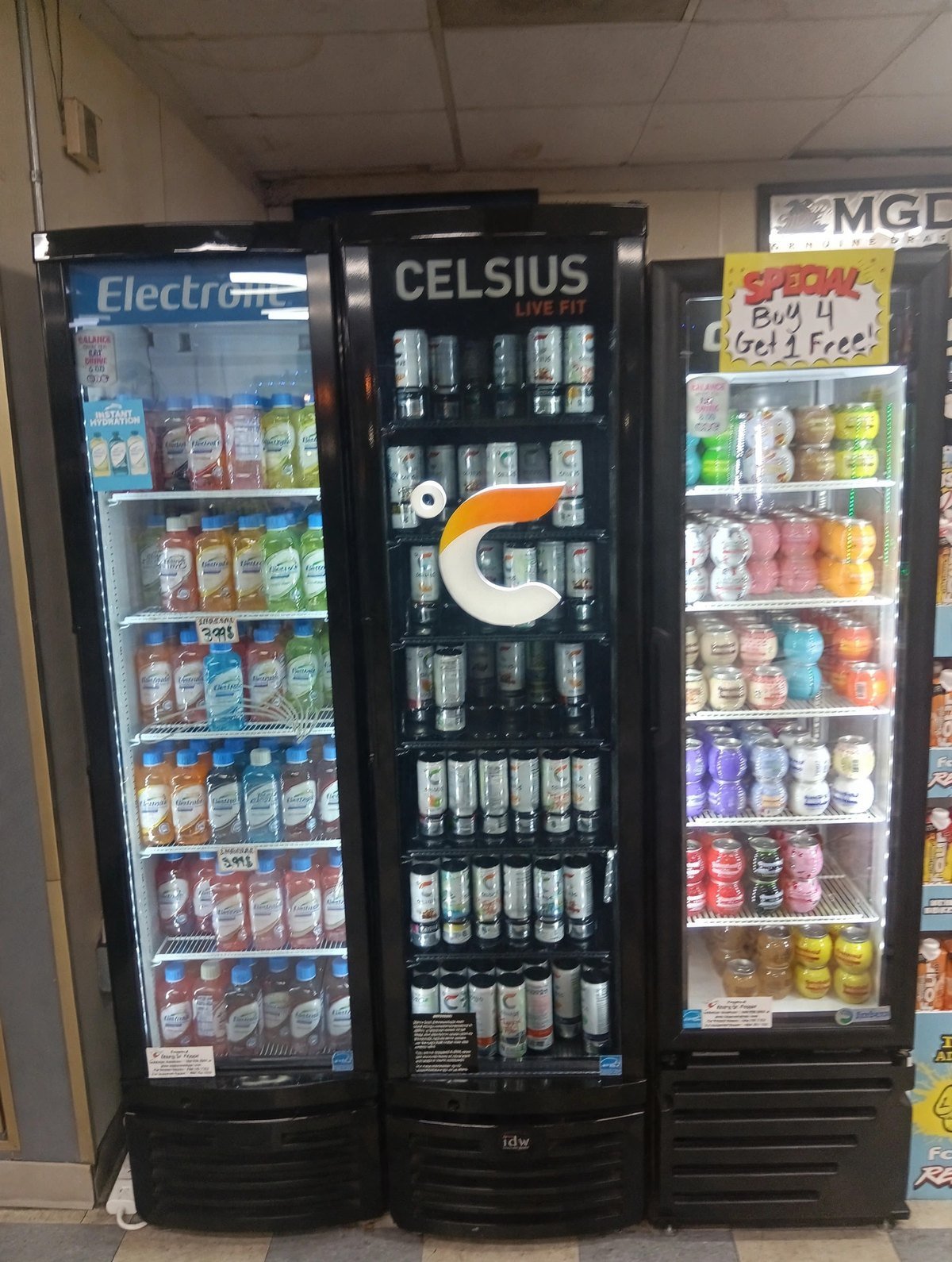 Cold drink coolers at E.B. Jr Market — electrolytes, energy drinks and ready-to-drink favorites